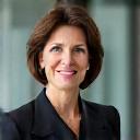 Professional female CFO reviewing financial charts with a confident expression